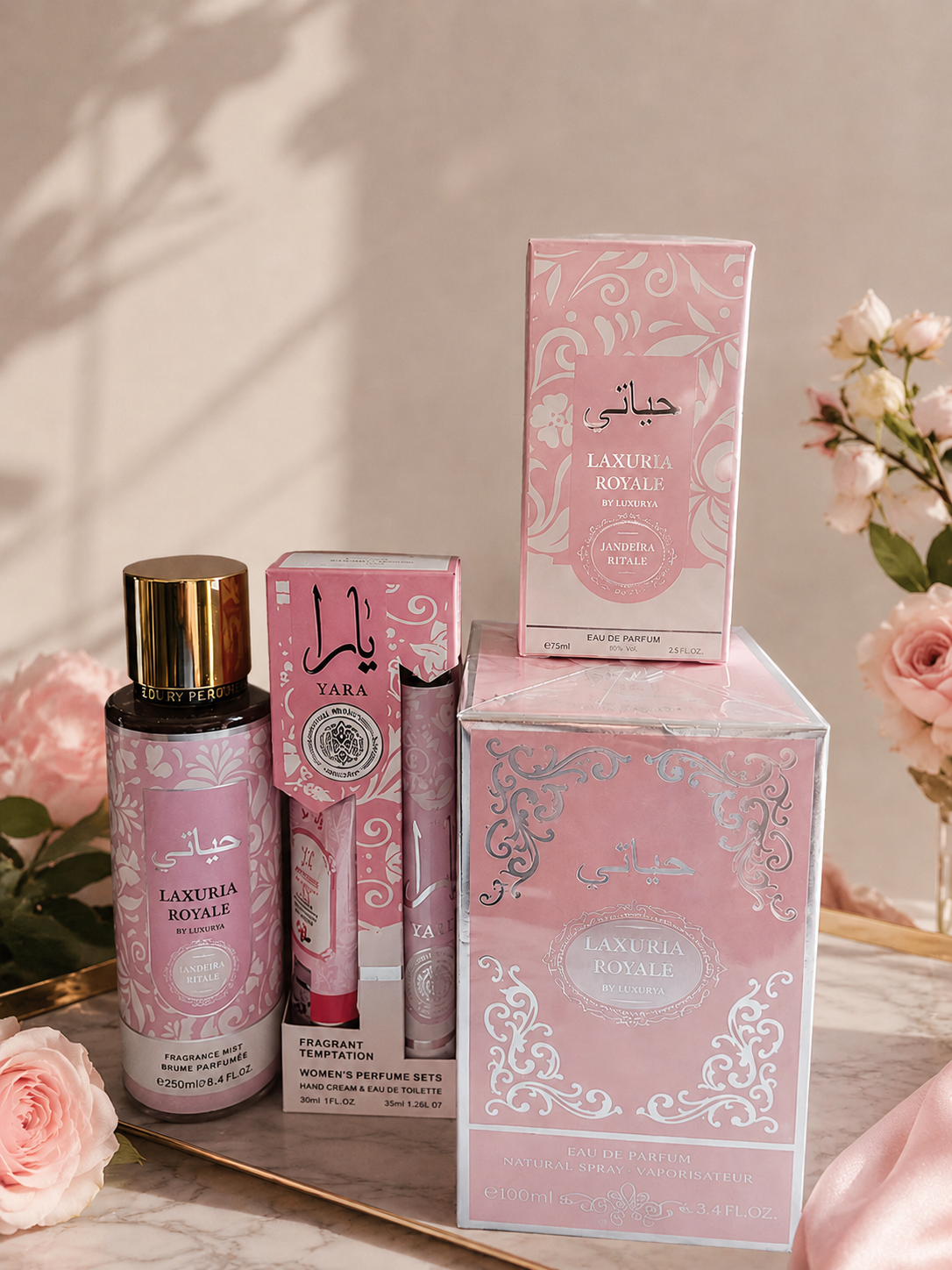 Lot petit prix yara rose de luxury contenant une brume en 250 ml, une eau de parfum en 100 ml et une en 50 ml et un coffret ( crème pour les mains et eau de toilette en 35 ml), pour femme